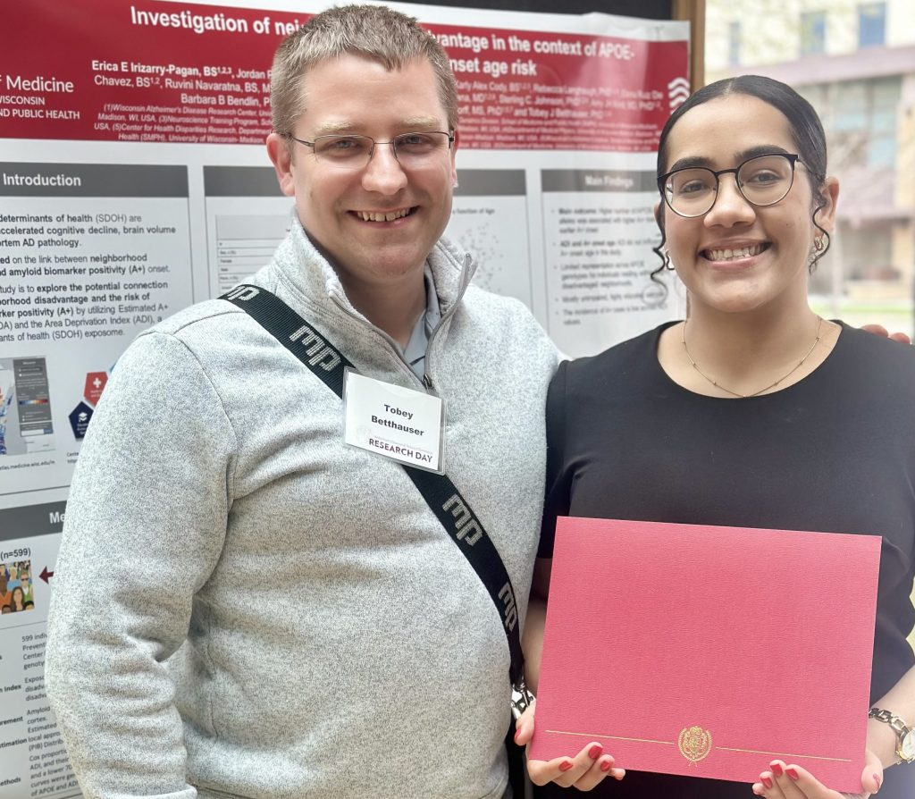 Left to Right: Tobey Bettthauser, Erica Irizarry Pagan. Erica is holding her award for Best Poster at ADRD 2023.