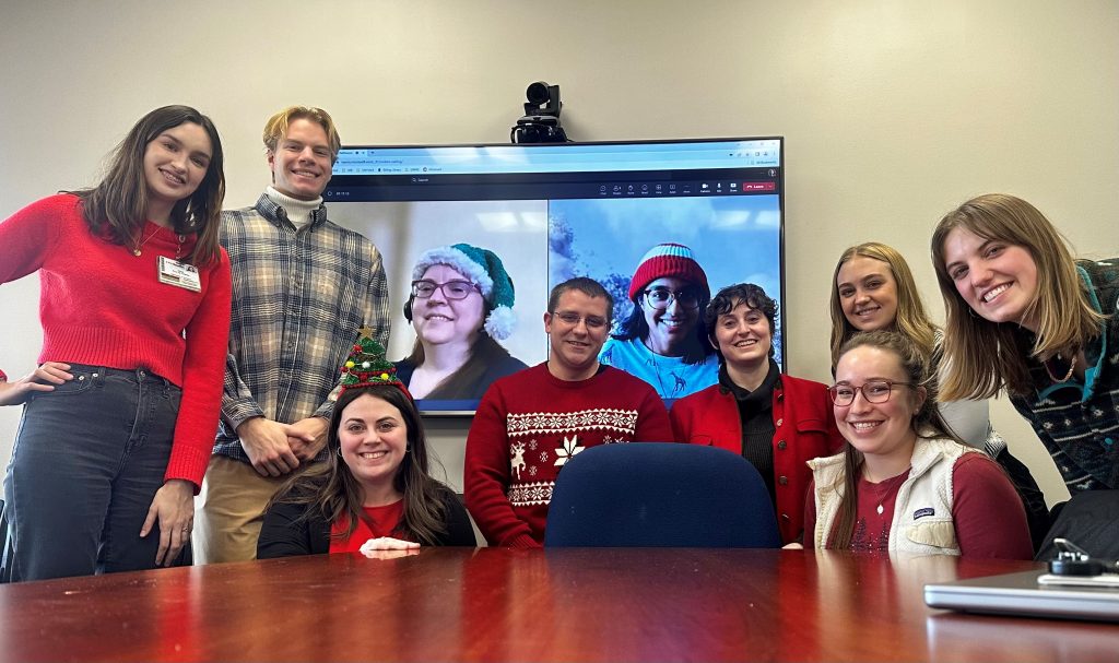 Left to Right - Elena Ruiz de Chavez, Jacob Morse, Finnuella Carey, Yuetiva Robles, Tobey Betthauser, Ruvini Navaratna, Margo Heston, Julia Horst, Margo Sanderfoot, Maddy Barger. 2023 Betthauser Lab Holiday Card!